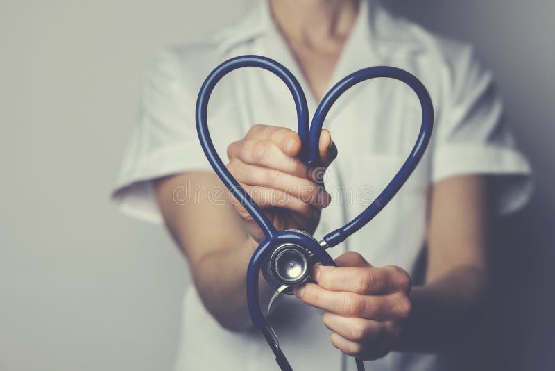 Healthcare job love concept. medical worker with heart shaped stethoscope