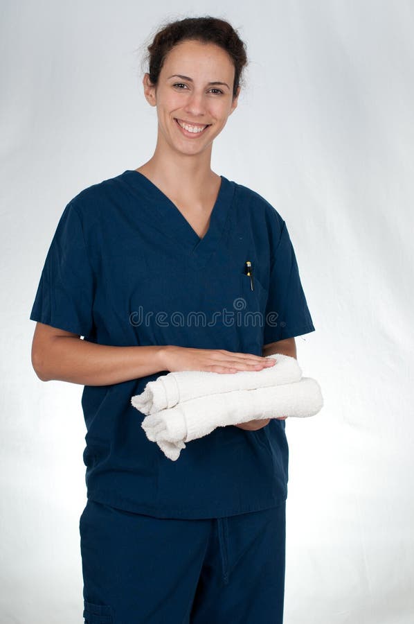 Healthcare professional in blue scrubs