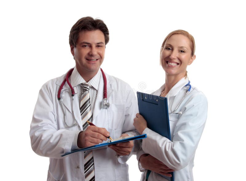 Smiling healthcare professionals holding folders of patient or medical information. Focus to male doctor.