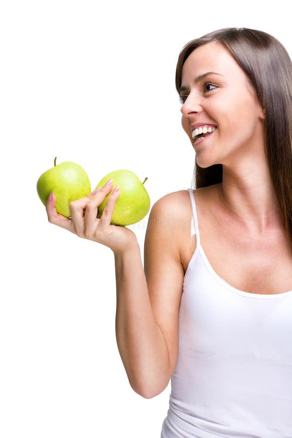 Healthful eating-Lovely woman holding an apple while laughing foto de stock royalty free Healthful eating-Lovely woman holding an apple while laughing foto de stock royalty free