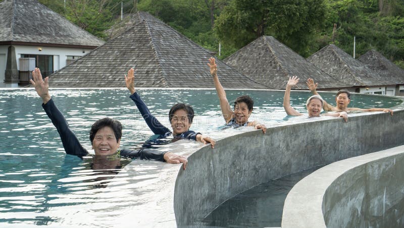 Healthy Asian Elderly Aging Senior Old Friends Exercising In Swimming