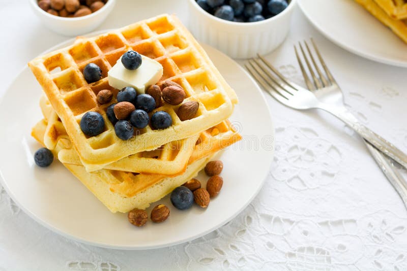 Healthy Breakfast. Belgian Waffles With Butter, Blueberry And Nuts On ...