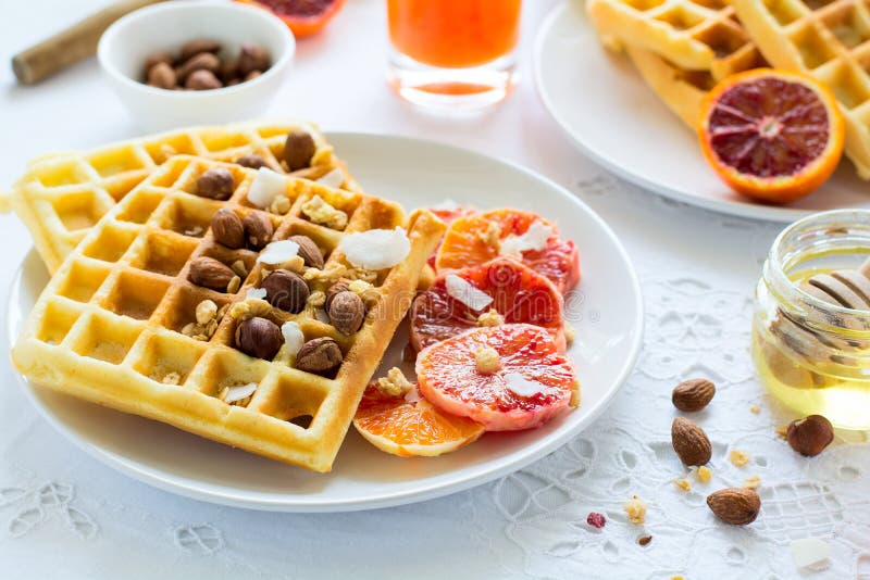 Healthy Breakfast. Belgian Waffles with Nuts and Blood Oranges Stock