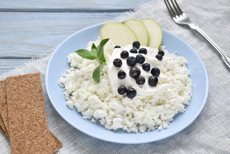 Healthy Breakfast of Cottage Cheese and Blueberries on a Napkin Stock