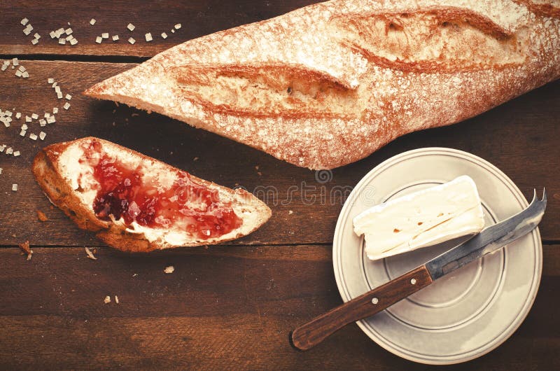 Healthy breakfast. Freshly baked and sliced French baguette with royalty free stock photo Healthy breakfast. Freshly baked and sliced French baguette with royalty free stock photo