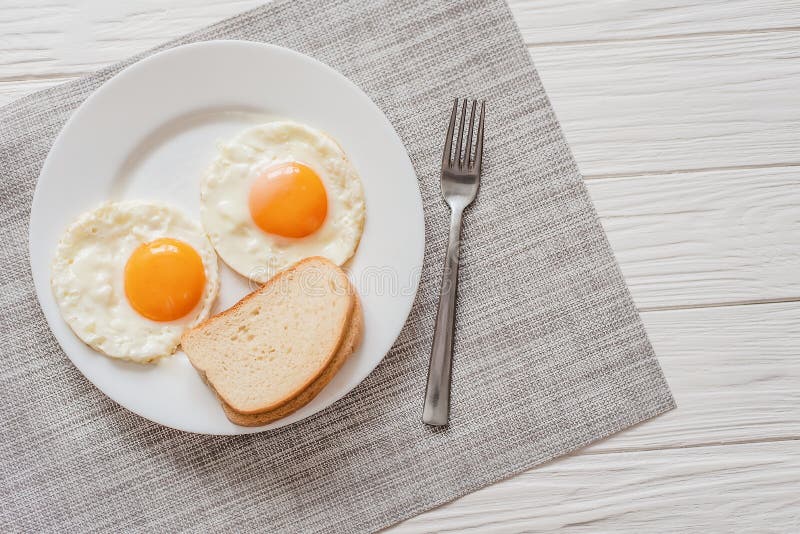 Healthy Breakfast with Fried Eggs on Wooden Table Stock Photo Image
