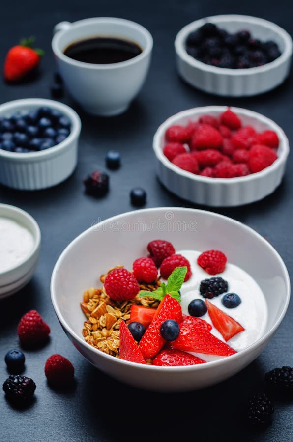 Healthy Breakfast with Granola, Greek Yogurt, Berries and Milk Stock