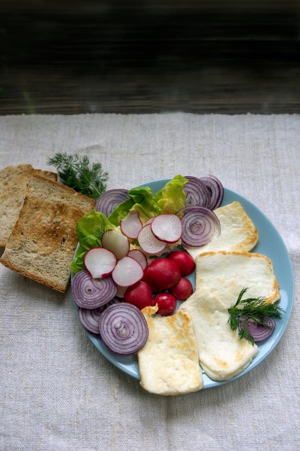 Healthy breakfast, halloumi cheese and crudities royalty free stock photo Healthy breakfast, halloumi cheese and crudities royalty free stock photo