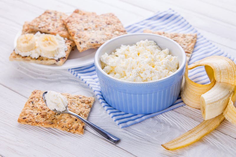Healthy Breakfast Including Cottage Cheese and Grainy Biscuits Stock