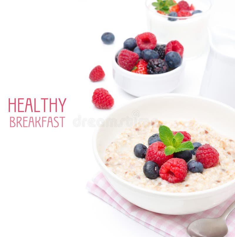 Healthy breakfast - oatmeal with fresh berries isolated on white