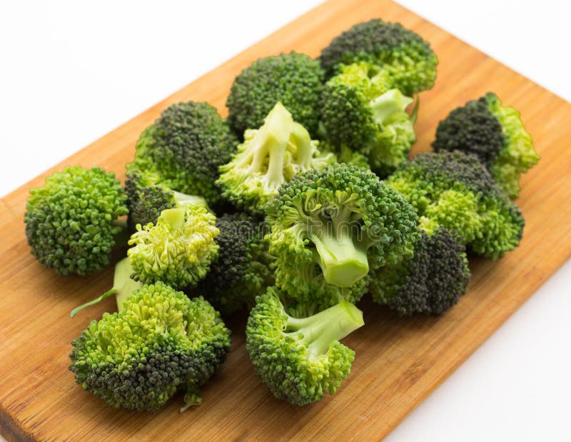 Fried Inflorescences of Broccoli with Provencal Herbs on White Plate