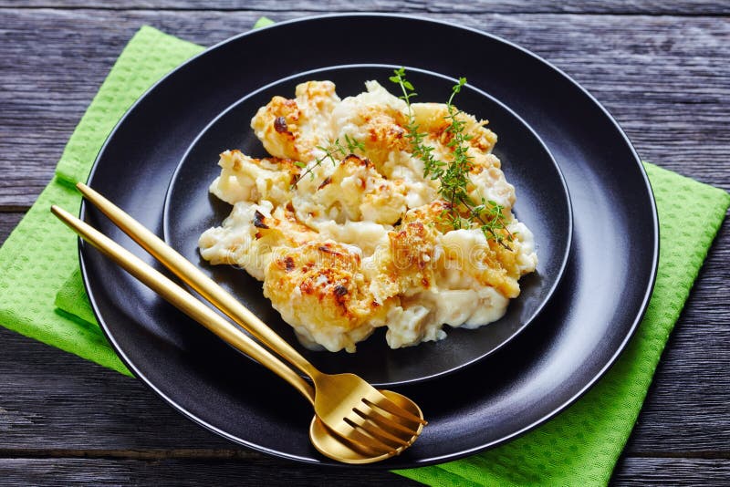 Healthy casserole cauliflower cheese on a plate stock photo