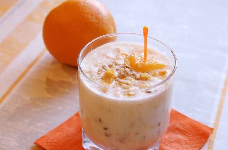 Healthy cereal and orange yoghurt breakfast royalty free stock photo