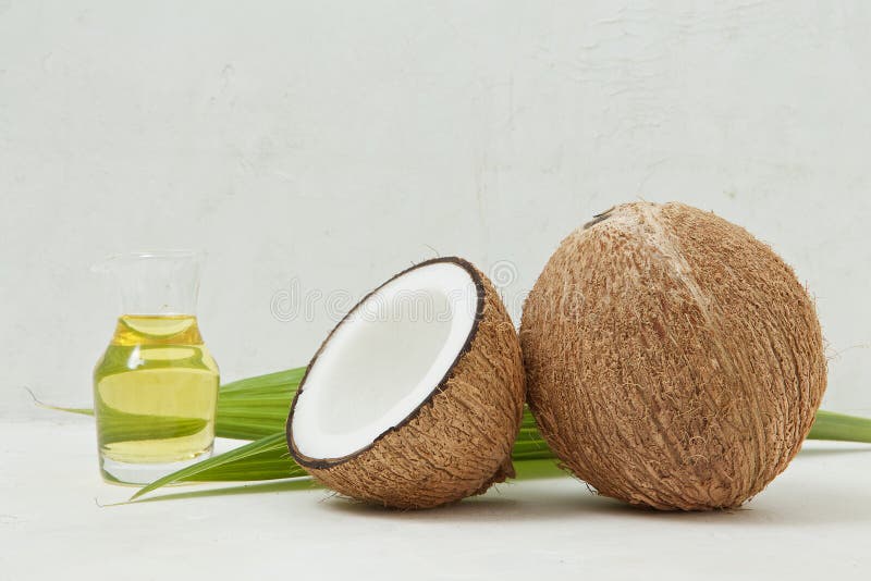 Healthy coconut oil, tropical, beauty spa concept - close up of