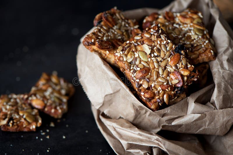 Healthy Cookies with Different Seeds and Nuts in a Paper Package. Stock