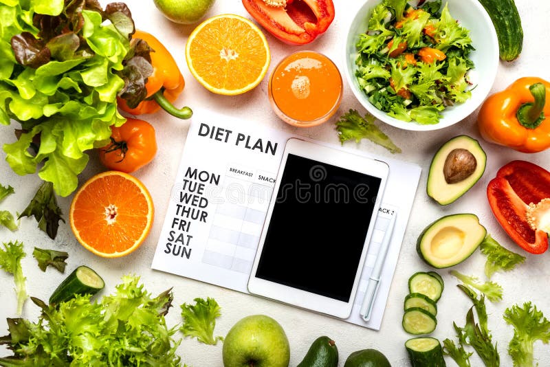 healthy-diet-eating-plan-weight-loss-program-on-the-sheet-and-tablet