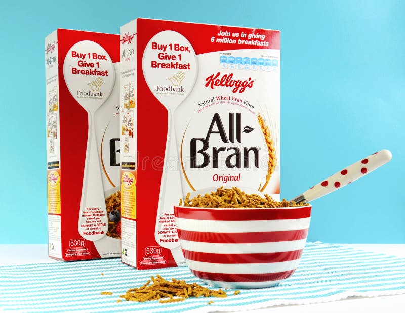 Two boxes of Kelloggs All-Bran, high fiber breakfast cereal, in red, white and blue breakfast setting. Two boxes of Kelloggs All-Bran, high fiber breakfast cereal, in red, white and blue breakfast setting.