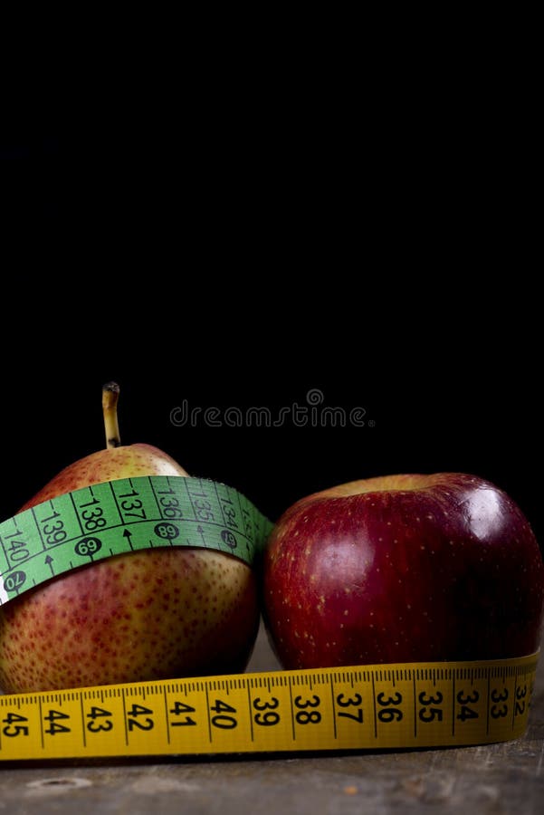 pear and apple representing types of overweight stock images pear and apple representing types of overweight stock images