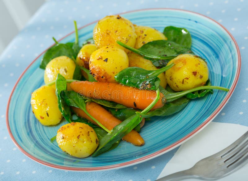 Baked New Potatoes with Spinach Stock Photo - Image of baked, cooking
