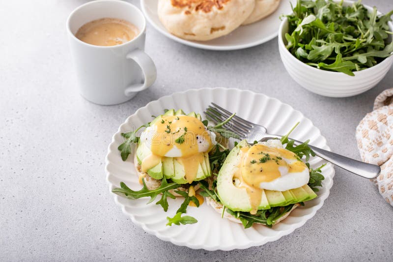 Healthy Egg Benedict with Avocado and Arugula Stock Photo Image of
