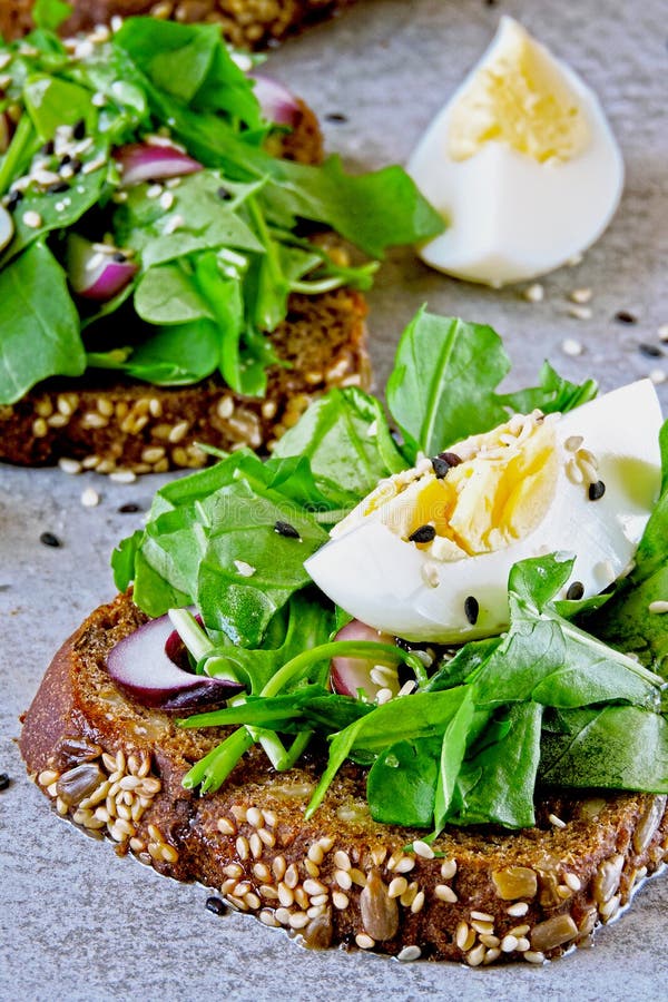 Healthy Fitness Toasts with Arugula and Egg. Useful Snack Lunch. Useful ...