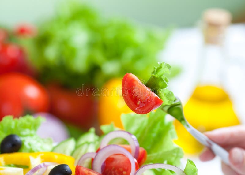 Healthy food fresh vegetable salad and fork