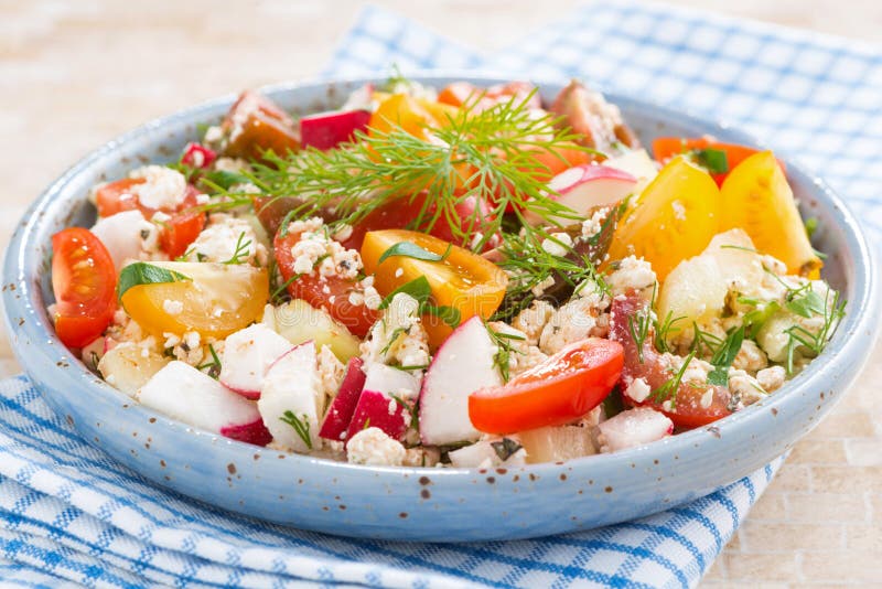 Healthy food - salad with fresh vegetables and cottage cheese