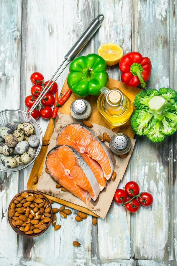 Healthy food. Salmon with honey, nuts and vegetables