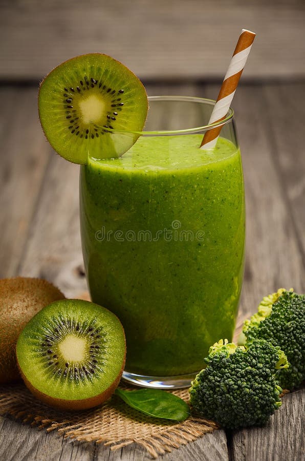 Healthy Green Smoothie with Kiwi, Broccoli and Spinach. Stock Photo