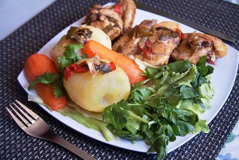 Healthy Lunch. Homemade food. White rice, Steamed potato,stewed chicken, watercress, and carrots.