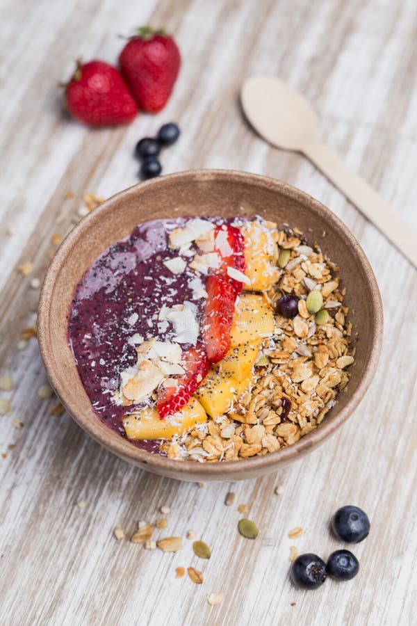 Healthy Mango and Strawberry Dessert with Oat and Yogurt Stock Photo