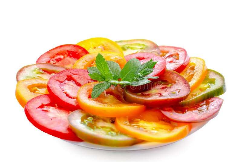 Healthy natural food colorful Tomato Slices and green mint, Fre