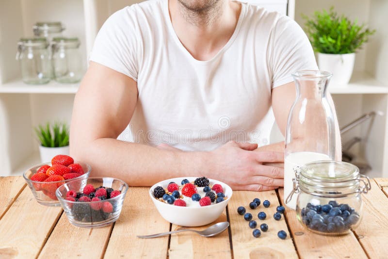 Healthy and Nutritious Yogurt with Cereal and Fresh Raw Berries Stock