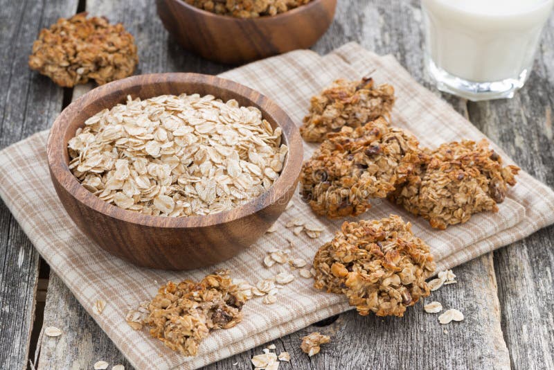 Healthy oatmeal cookies and a glass of milk, top view