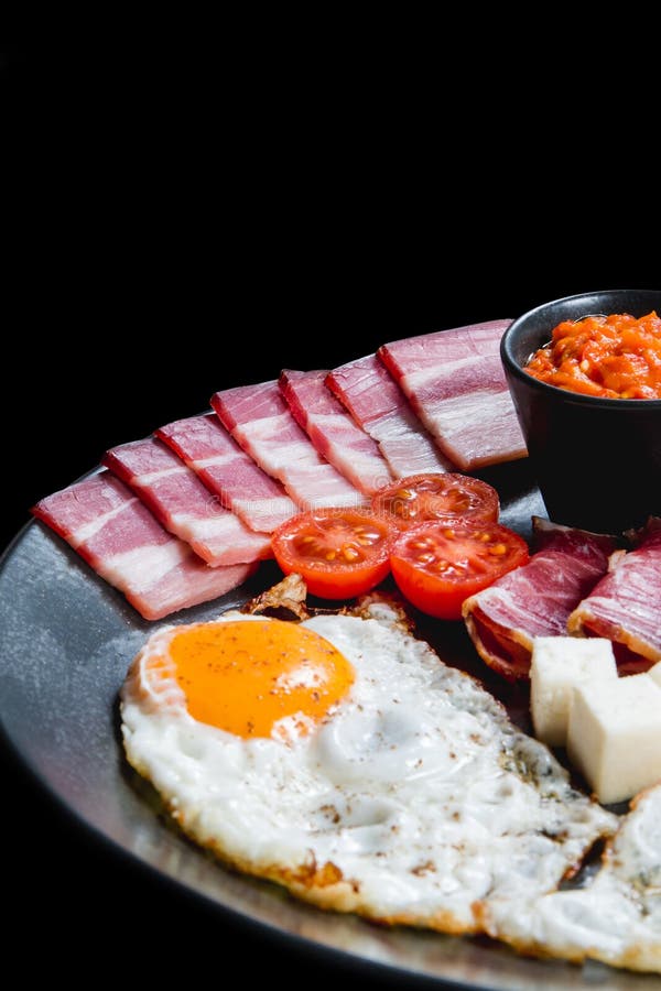 Healthy Breakfast with Eggs, Dry Meat and Vegetables Stock Photo