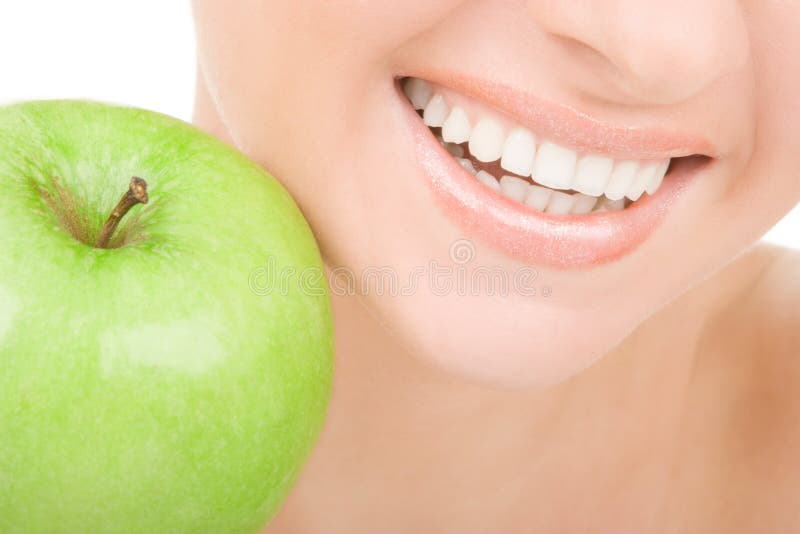 Healthy teeth and apple