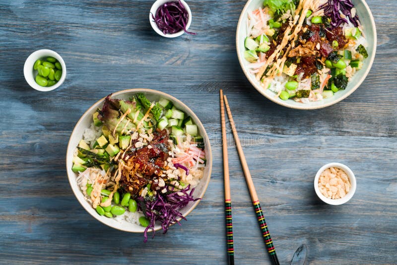 Healthy tuna poke bowl overhead top view.