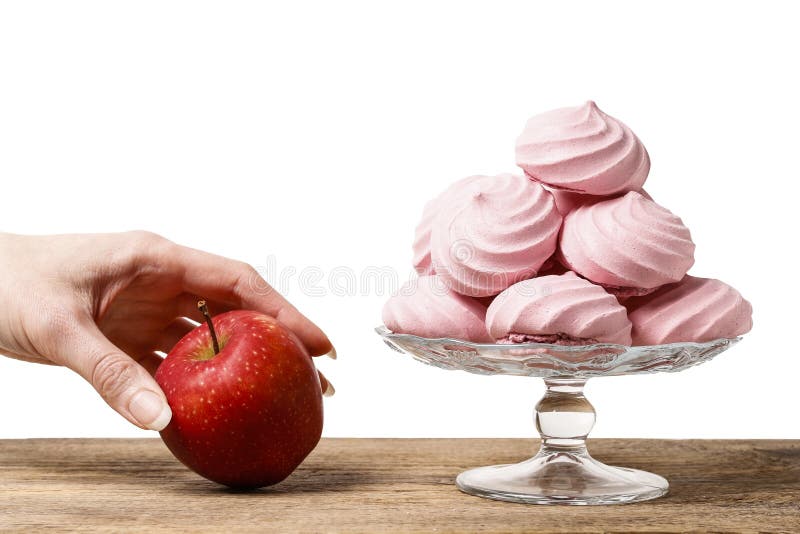 Healthy or Unhealthy Snack. Apple or Cake. Stock Photo Image of
