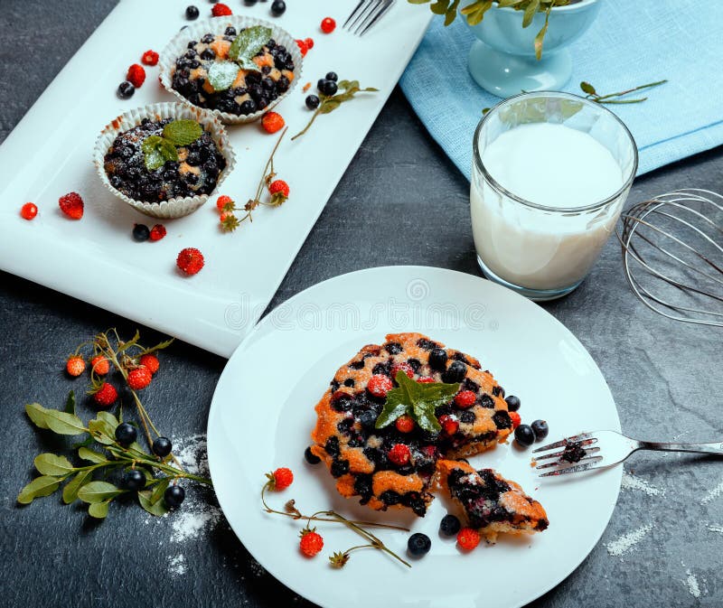 Healthy vegan banana blueberry muffins with fresh berries royalty free stock images Healthy vegan banana blueberry muffins with fresh berries royalty free stock images