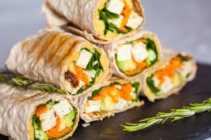 Healthy Vegan Tofu Tortilla Wraps with Tofu and Vegetables Stock Image
