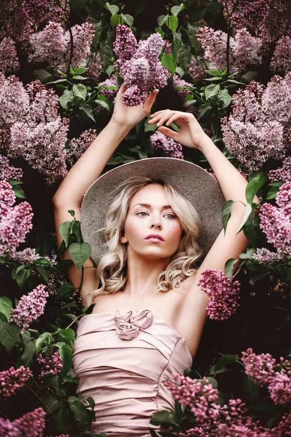 Healthy Woman with Lilac Flowers. stock images Healthy Woman with Lilac Flowers. stock images