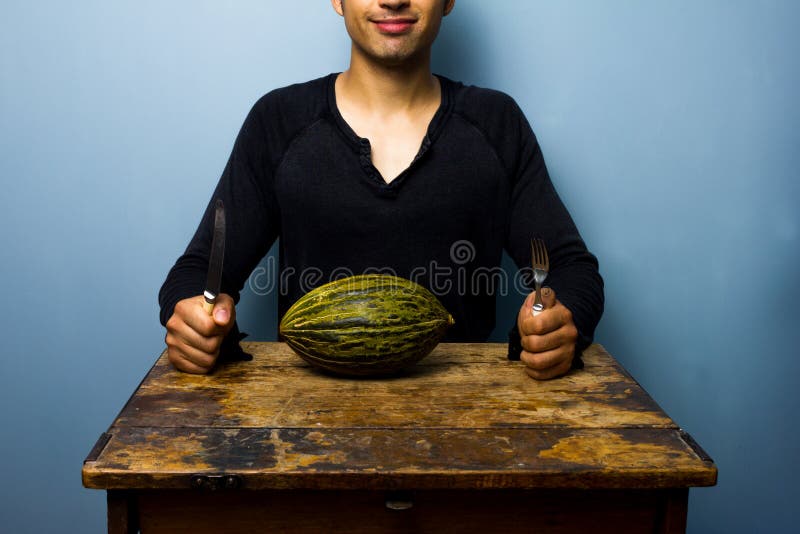 Healthy Young Man Having a Melon for Dinner Stock Image Image of