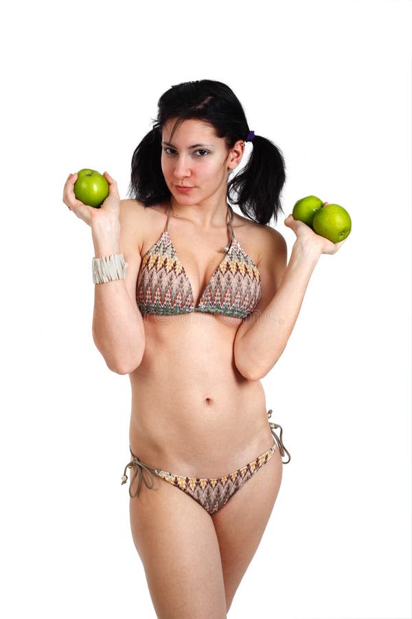 Young woman in bikini holds some fresh apples. Bikini granny stock images, royalty-free photos and pictures