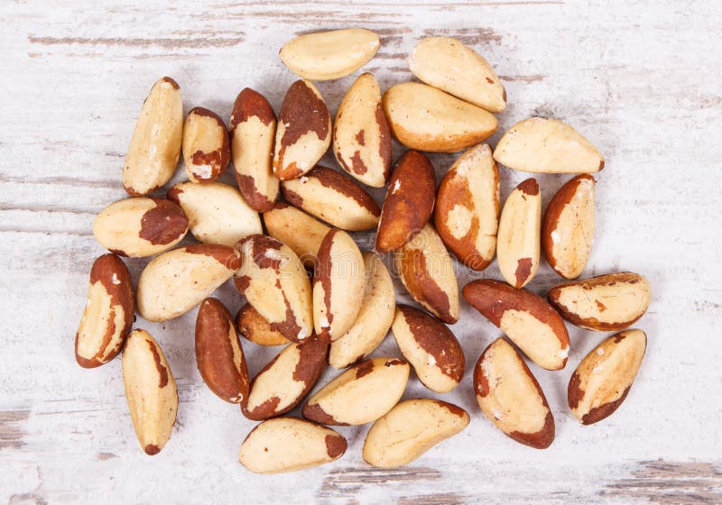 Heap of brazil nuts on rustic board royalty free stock image Heap of brazil nuts on rustic board royalty free stock image