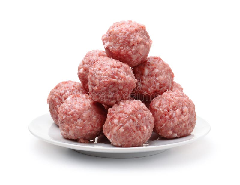 Heap of fresh raw meatballs on plate