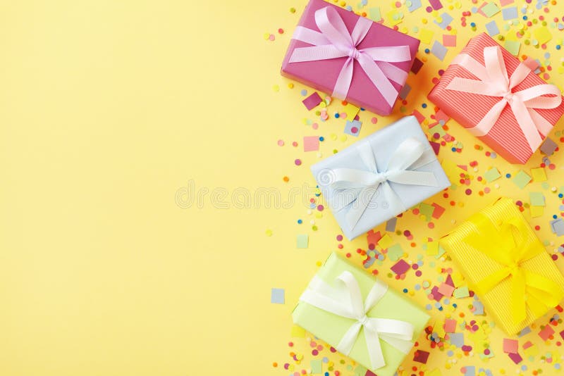 Heap of Gift or Present Boxes and Confetti on Pastel Table Top View. Happy  Birthday Background Stock Photo - Image of present, card: 150728418