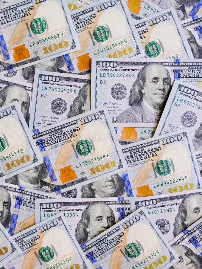 Heap of hundred dollar bills background. USD cash money. Pile of USA banknotes royalty free stock photography Heap of hundred dollar bills background. USD cash money. Pile of USA banknotes royalty free stock photography
