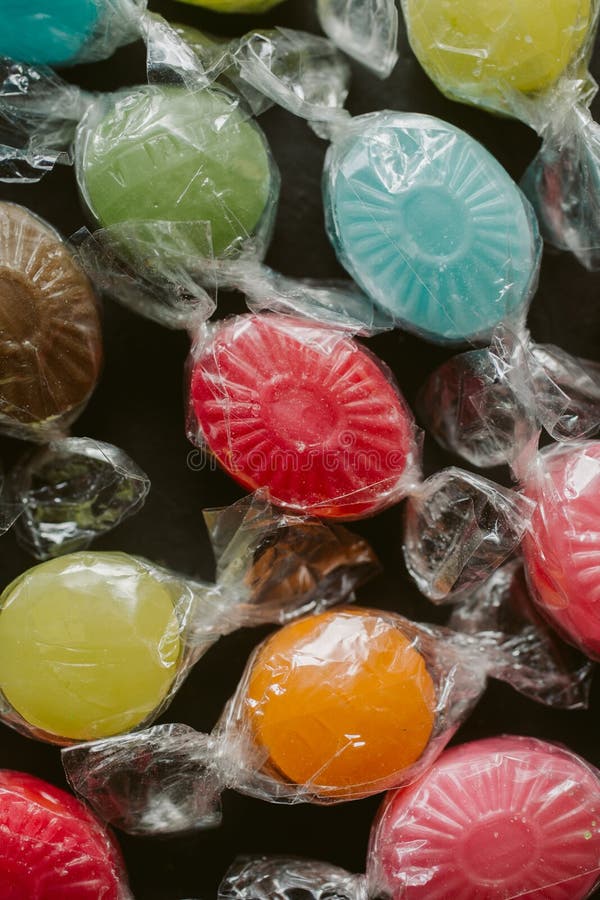 Heap of multicolor candies as texture and background for design. Many different candies of different flavors as background. royalty free stock photography