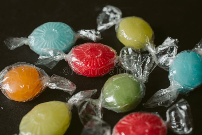 Heap of multicolor fruity candies as texture and background for design. Many different candies of different flavors. royalty free stock photos