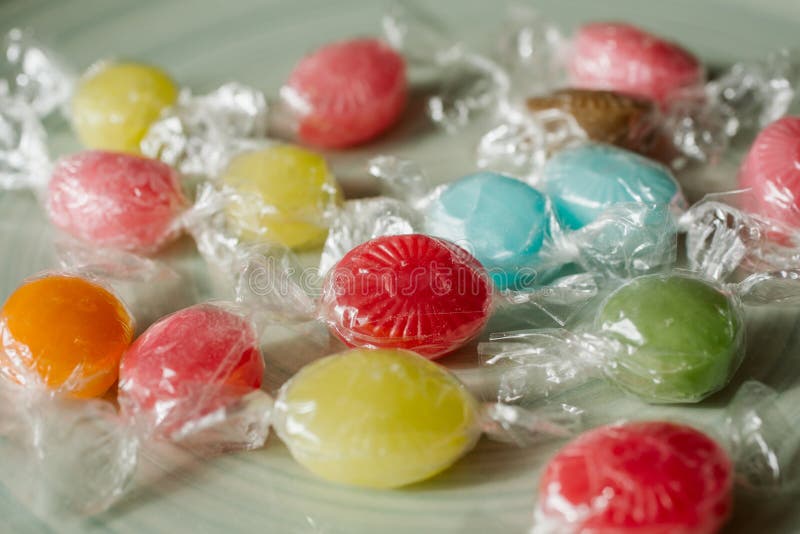 Heap of multicolor fruity candies as texture and background for design. Many different candies of different flavors. royalty free stock photo